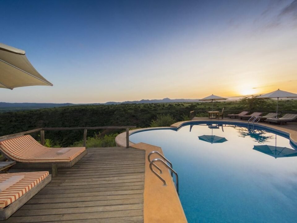 Best-value luxury Lake Manyara safari lodges with a swimming pool overlooking Tanzania's Great Rift Valley.
