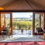 Inside vs Outside Masai Mara accommodation showing a safari lodge overlooking the savanna.
