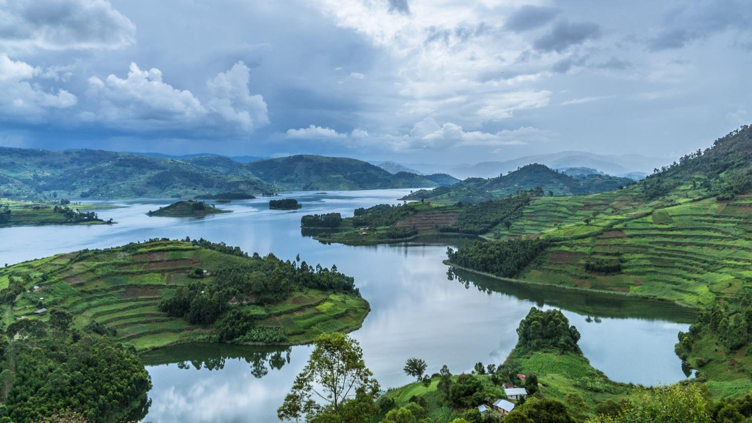 Aerial view of Lake Bunyonyi's green islands and surrounding terraced highlands in southwestern Uganda.