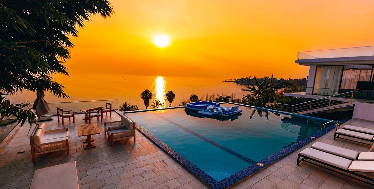 Lake Kivu waterfront at sunset, ideal for peaceful Christmas and New Year holidays in Rwanda.