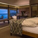 Luxury tented suite at The Cliff Nakuru overlooking Lake Nakuru National Park in Kenya.