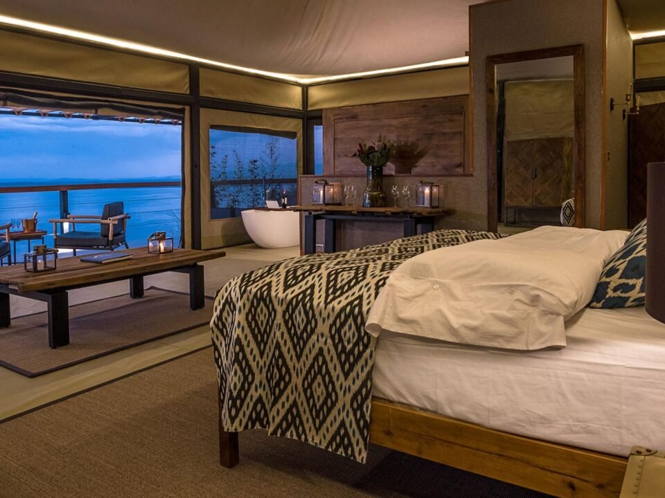 Luxury tented suite at The Cliff Nakuru overlooking Lake Nakuru National Park in Kenya.