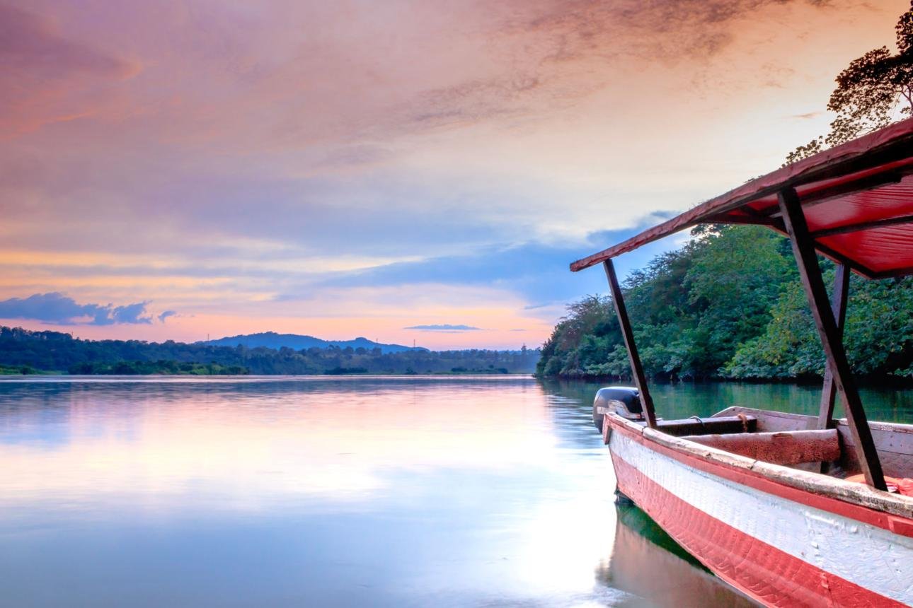 Source of the Nile sightseeing area in Jinja Uganda with boats on the river