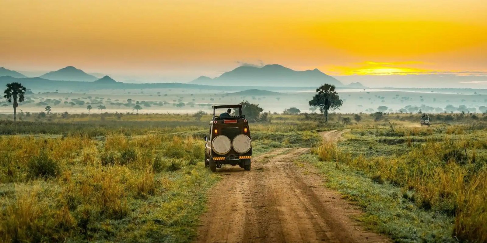 Private 4x4 safari vehicle traveling through Uganda, illustrating transport arrangements included in safari quotations.